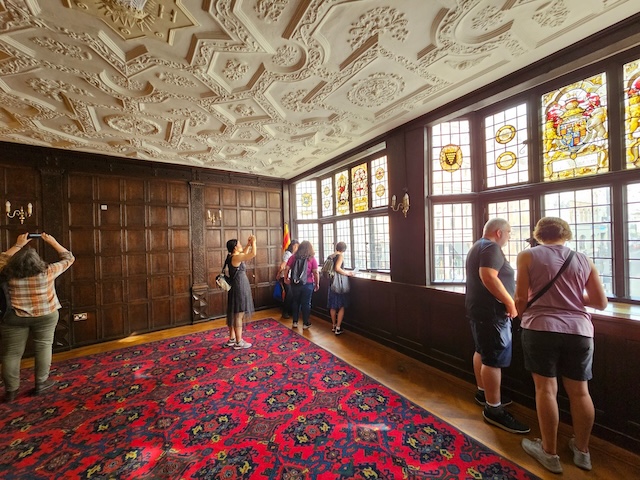 The iconic timber-framed facade of Prince Henry’s Room stands in contrast to modern Fleet Street.