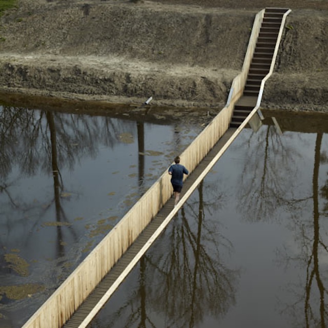 The Moses Bridge parts the water like the biblical story, offering a unique pedestrian experience.