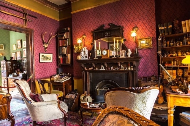 The living room, with Holmes' violin and deerstalker hat, captures the spirit of Victorian London.