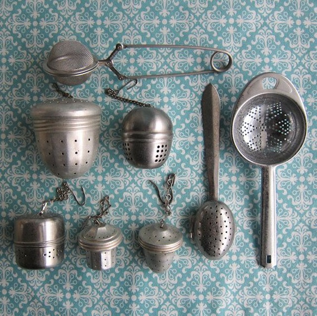 The vintage teapot tea strainer