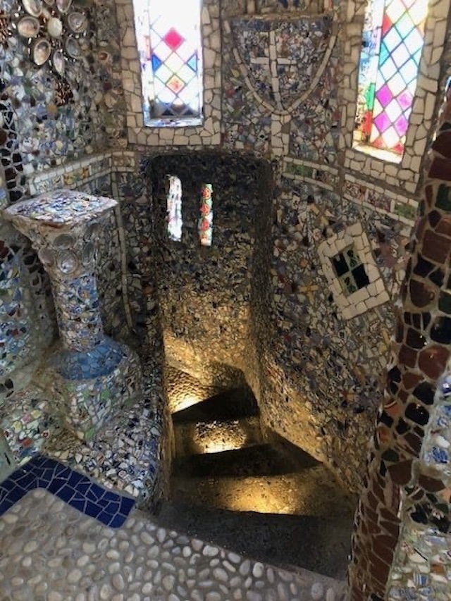 An artistic shot highlighting the chapel’s intricate mosaic cross.