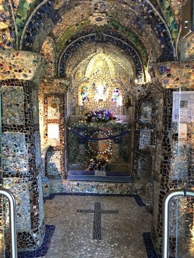 The restored mosaic walls glisten after recent preservation efforts.