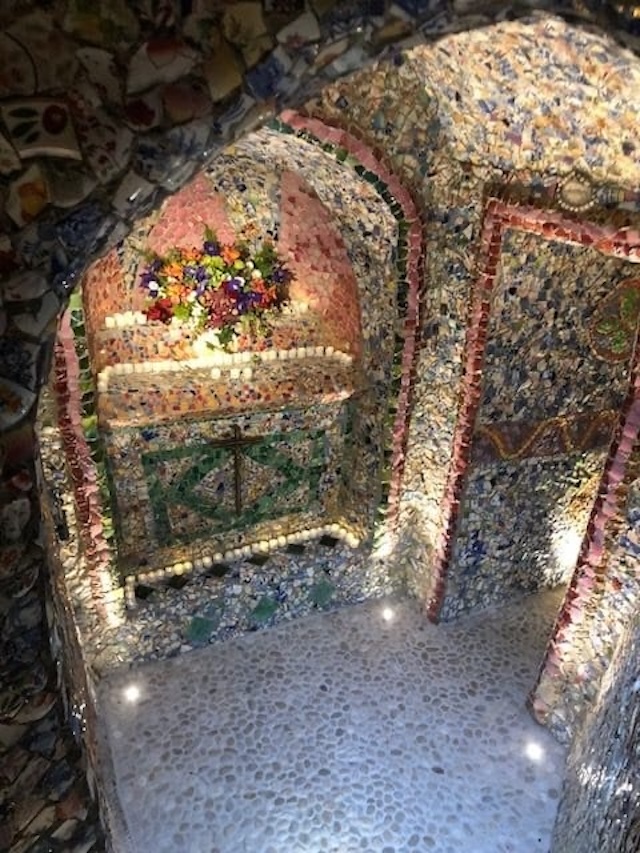 The interior of The Little Chapel, where every inch is adorned with stunning mosaic patterns.