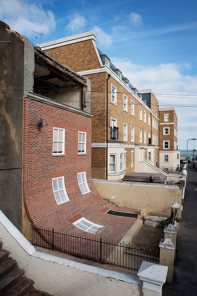 The Sliding Facade House in Margate, with its seemingly melting brick design, is a modern art marvel.