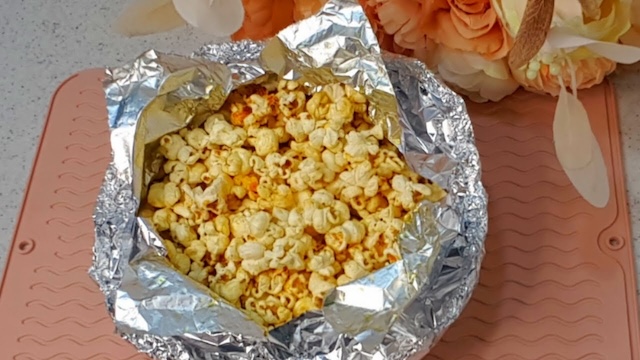 The satisfying moment after popping Jiffy Pop—crisp, freshly-made popcorn inside the foil, ready to be devoured