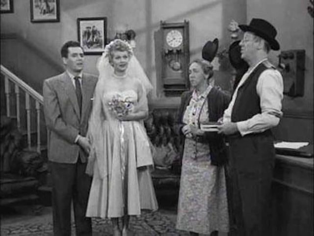 A classic moment from "I Love Lucy," capturing a scene filled with charm and humor, showcasing the iconic couple on their big day.