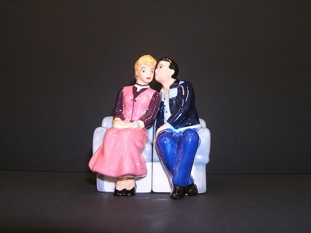 A pair of charming figurines featuring Lucy and Ricky, a nostalgic keepsake for fans of the iconic show.