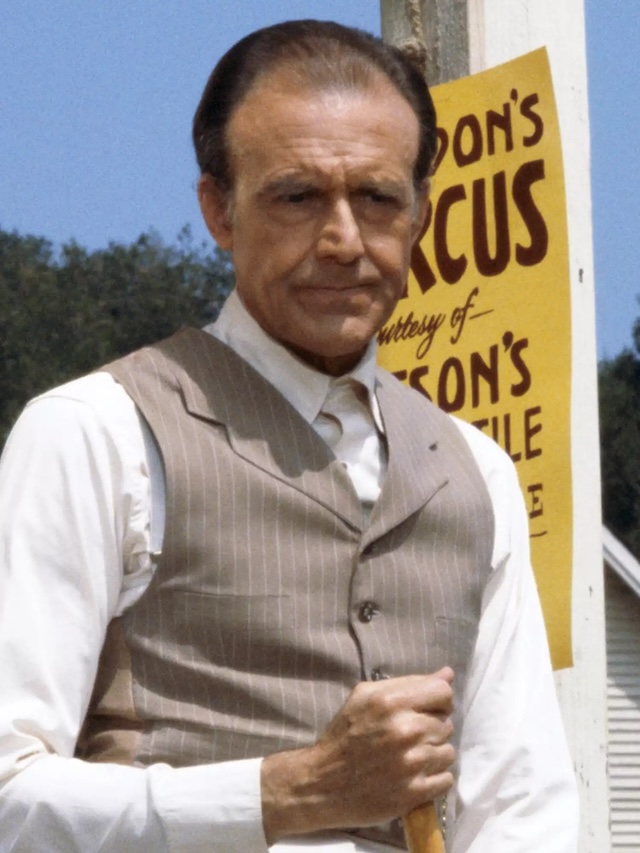 Richard Bull as Nels Oleson - Richard Bull, the compassionate Nels Oleson, captured both in character and later in life, continuing to embody wisdom and warmth.