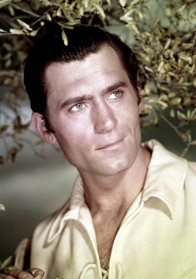 Clint Walker in a serene pose, reflecting his calm and rugged on-screen persona, beloved by fans of Western television.