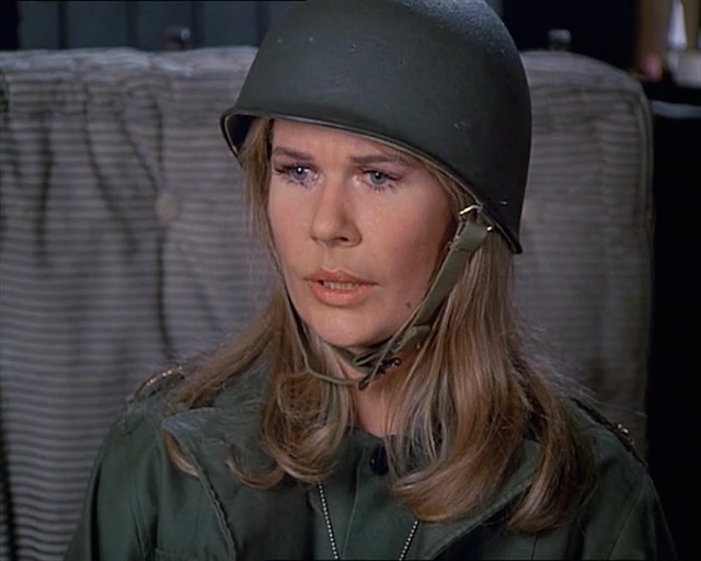 Major Margaret "Hot Lips" Houlihan, portrayed by Loretta Swit, showing her in a serious moment on the battlefield in the iconic M*A*S*H series