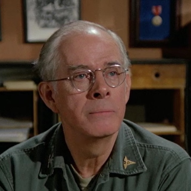 A thoughtful Colonel Potter during one of his many moments of reflection, showing the depth of character Harry Morgan brought to the role.