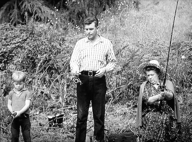 Andy Griffith (Andy Taylor) takes his son, Opie (Ron Howard), and Aunt Bee (Frances Bavier) out for a relaxing day of fishing, one of the show's signature wholesome moments