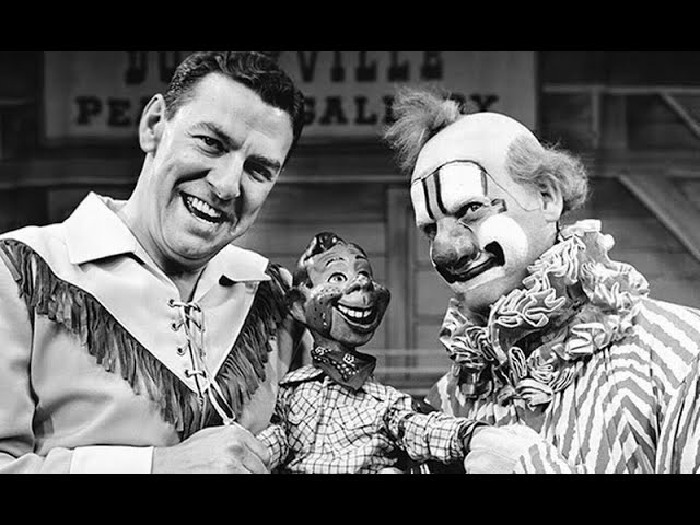 Buffalo Bob Smith, Howdy Doody, and Clarabell the Clown—three iconic characters from the classic children's television show The Howdy Doody Show.