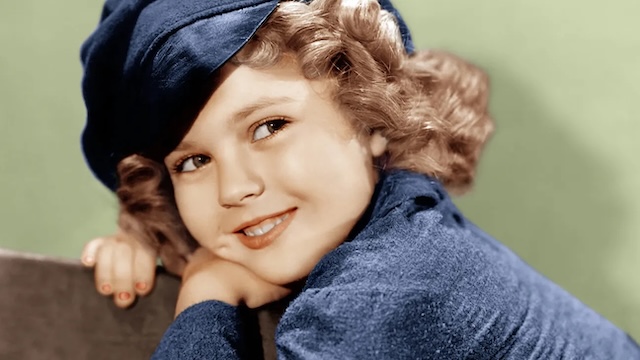 Shirley Temple's enchanting look in one of her iconic roles during her early film career. Her unforgettable presence made her a symbol of hope during the Great Depression