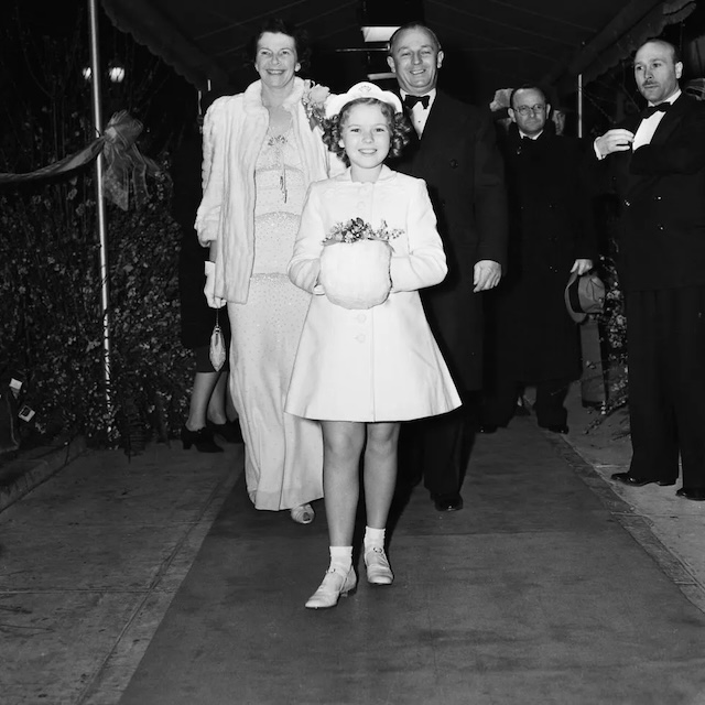 Shirley on the red carpet with her proud parents, George and Gertrude Temple