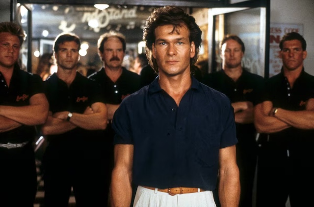 Patrick Swayze as Dalton and Sam Elliott as Wade Garrett in "Road House" - The dynamic duo at The Double Deuce