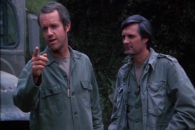 B.J. Hunnicutt (Mike Farrell) and Hawkeye Pierce (Alan Alda) exchange strategies on how to deal with the absurdities of war and hospital life in M*A*S*H, a defining moment in the series.