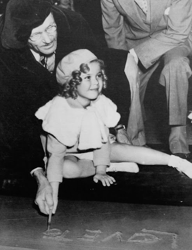 At just seven years old, Shirley Temple left her handprint in the cement at Grauman's Chinese Theater, a testament to her legendary career