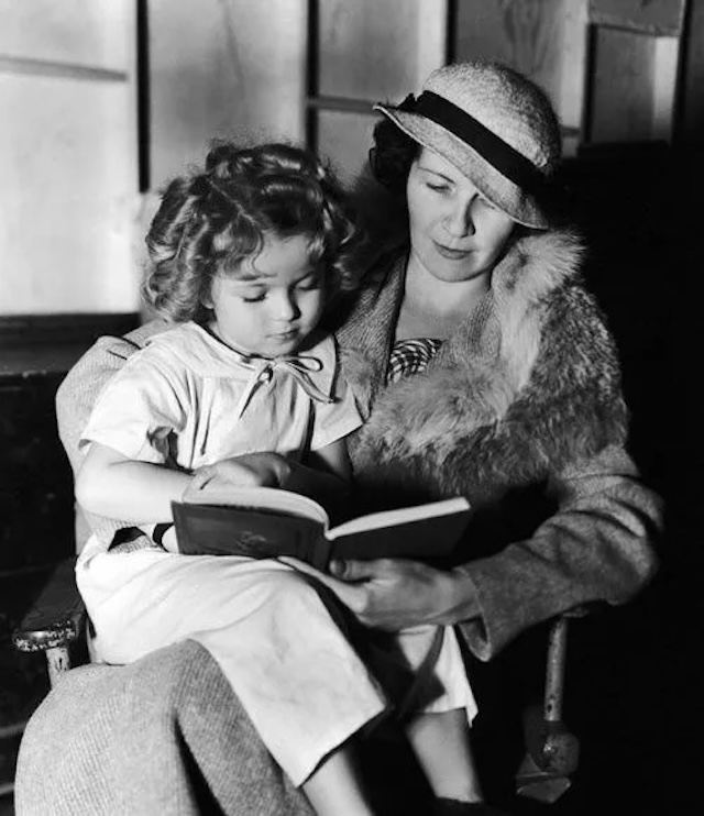 Gertrude reading with young Shirley, always guiding her through stardom