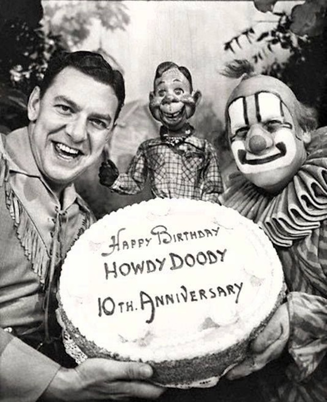 Celebrating a decade of The Howdy Doody Show—a special moment marking the 10th anniversary with a commemorative cake.