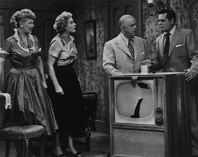 A humorous moment from "I Love Lucy," where the Ricardos face yet another household mishap, much to the delight of audiences.