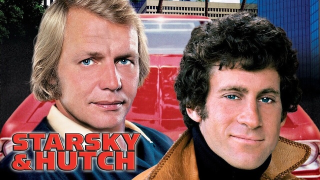 A memorable promotional shot for Starsky & Hutch, highlighting the instantly recognizable duo with the iconic red-and-white-striped Gran Torino in the background