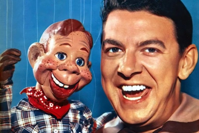 A vibrant color portrait of Buffalo Bob Smith and his cheerful puppet, Howdy Doody, capturing the essence of this beloved TV show.