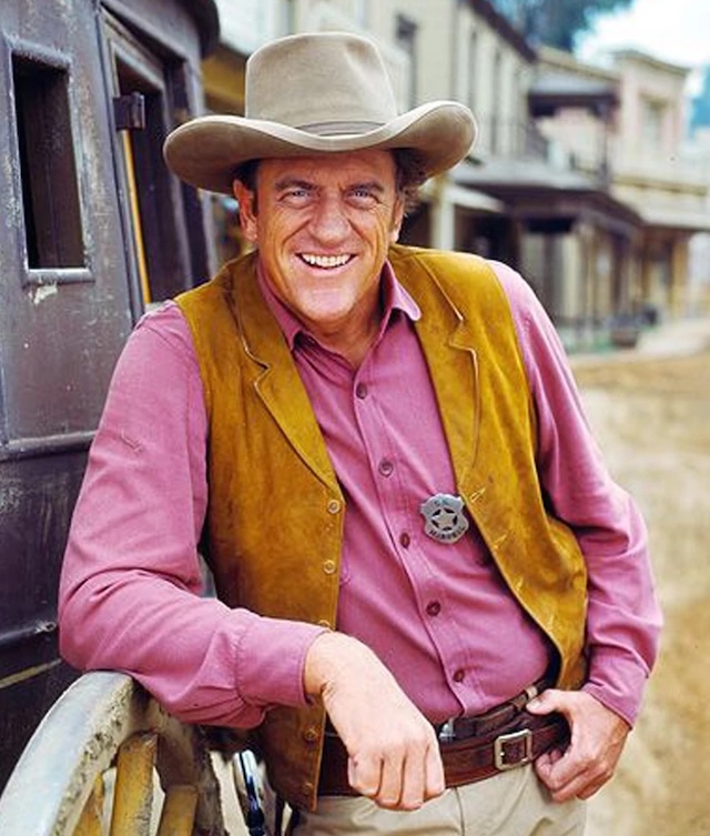 James Arness as Matt Dillon, looking ever so sharp in his sheriff's badge, ready to maintain law and order in Dodge City