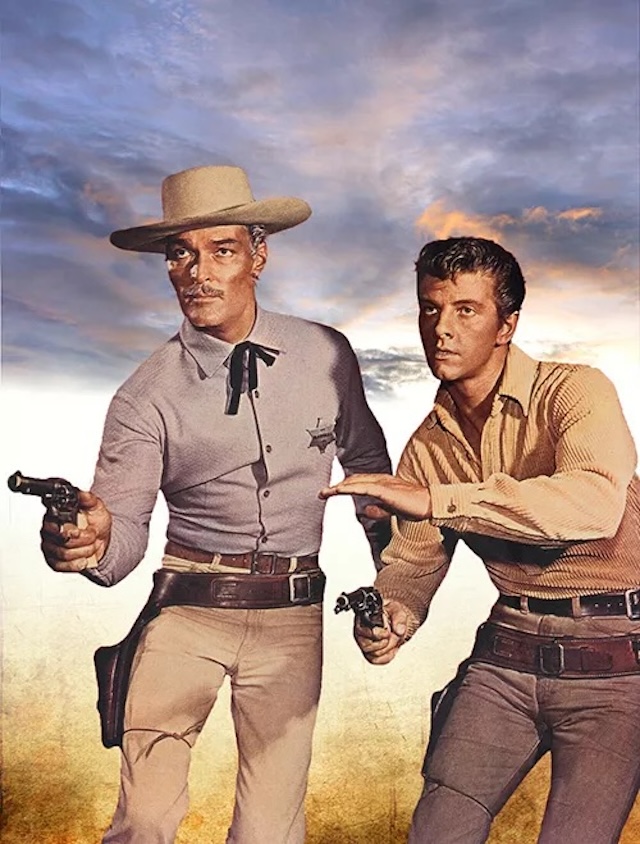 John Russell and Peter Brown in an action-ready pose as Marshal Dan Troop and Deputy Johnny McKay, symbolizing their unwavering determination to keep Laramie safe in Lawman