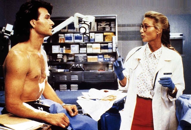 Dalton and Dr. Elizabeth "Doc" Clay (played by Kelly Lynch) share a moment in the hospital, hinting at the budding romance in "Road House."