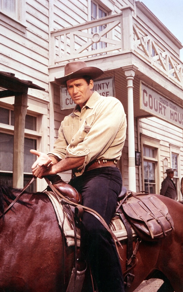 Clint Walker, with his loyal horse by his side, represents the enduring spirit of the frontier.