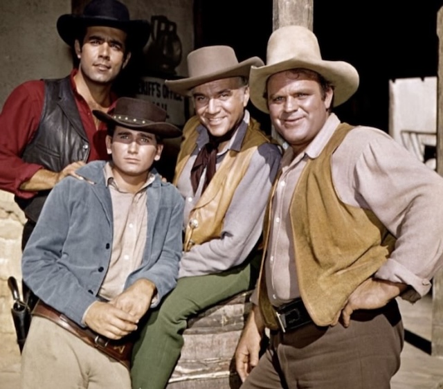 A photo of the Cartwright family in their prime, with each member prepared to face the challenges of life in the wild west.