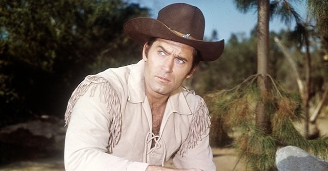 Clint Walker, armed and ready, is the quintessential Western hero, always prepared to protect those in need.