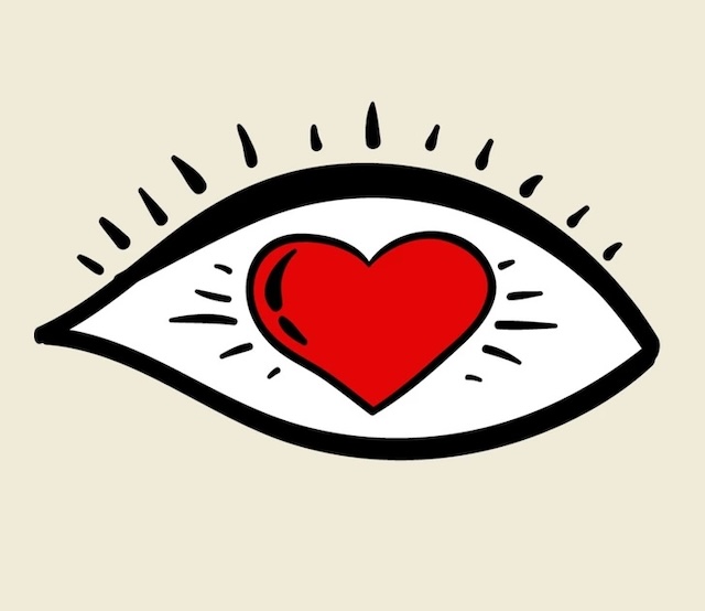 An eye with a heart symbol at its center, representing love, empathy, and an open soul