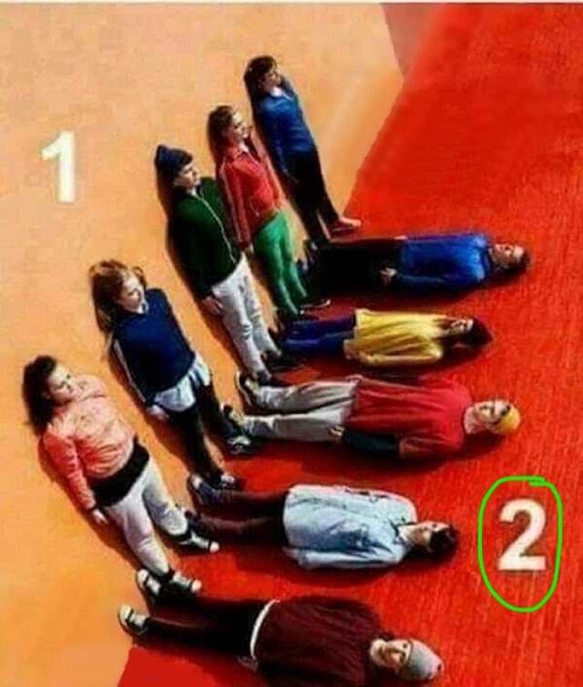 The Answer: Group 2 is standing! The clue lies in the hair of the girl in Group 1, which is affected by gravity, showing that they are actually lying down.