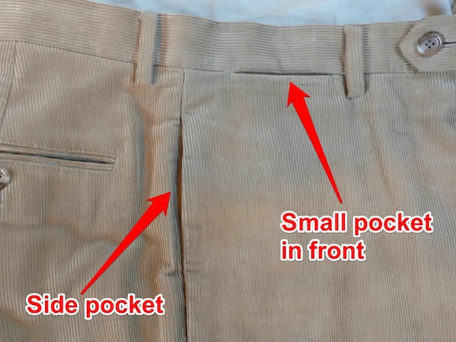 A view of corduroy pants with a front small pocket and a larger side pocket, illustrating how the design has been adapted to different materials and styles.