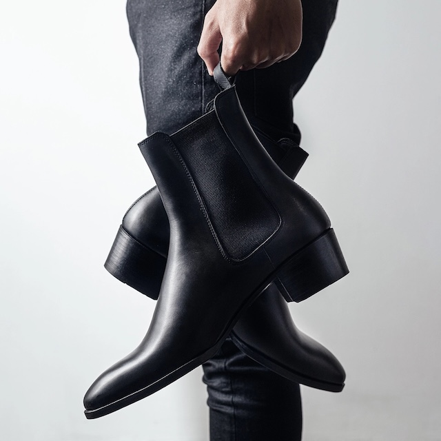 The pull tab on these sleek Chelsea boots not only adds style but also serves the practical function of helping you put them on effortlessly.