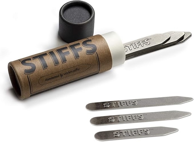 A tube of metal collar stays, labeled "Stiffs," showcasing the evolution of collar fashion aids.