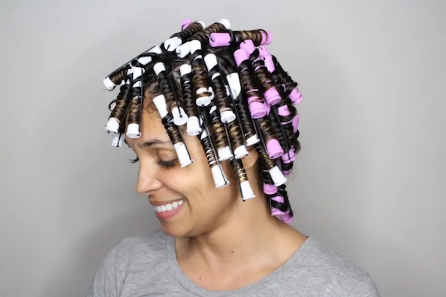 Setting the hair with perm rods – a technique that has stood the test of time in the world of hairdressing.