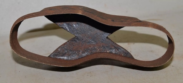 The robust steel body of this vintage shoe sole die cutter reflects years of use in traditional shoemaking