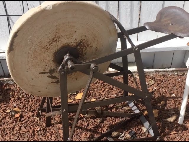 Imagine manually sharpening tools with this vintage foot pedal grinder