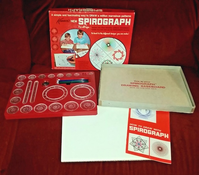 Complete with its drawing baseboard and guidebook, this Spirograph kit was every young artist's dream