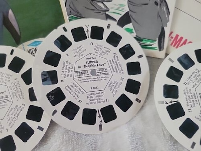 A collection of vintage view master reels in storage, ready to transport the viewer back in time to magical adventures