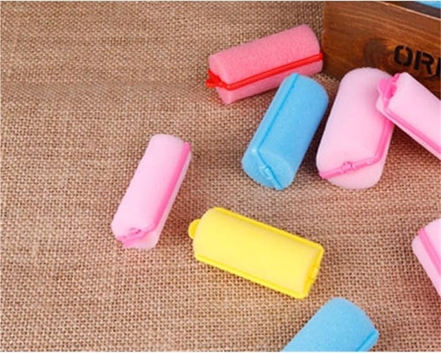 A close-up look at these iconic foam hair rollers, available in soft pastel shades. A must-have for any vintage beauty enthusiast!