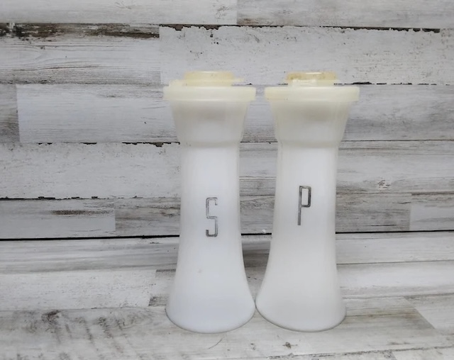 These durable salt and pepper shakers were made with high-quality plastic, a signature of Tupperware products, and widely recognized by their distinctive "S" and "P" labels.