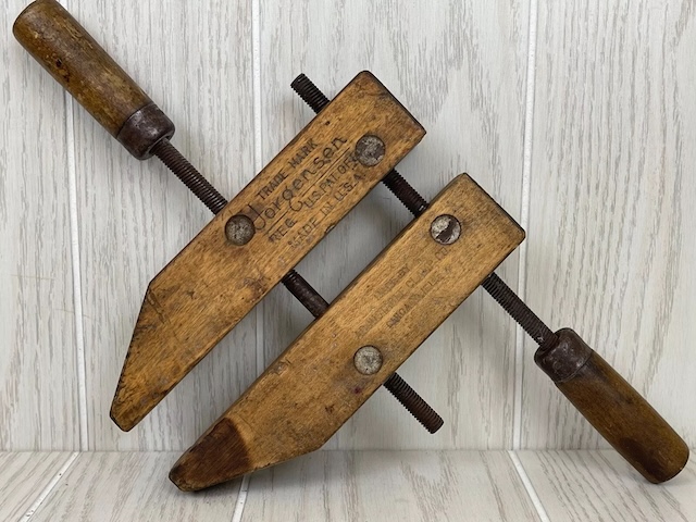 This classic vintage adjustable wood clamp by Jorgensen still proudly shows its manufacturer stamp and craftsmanship, a true symbol of quality from a bygone era.