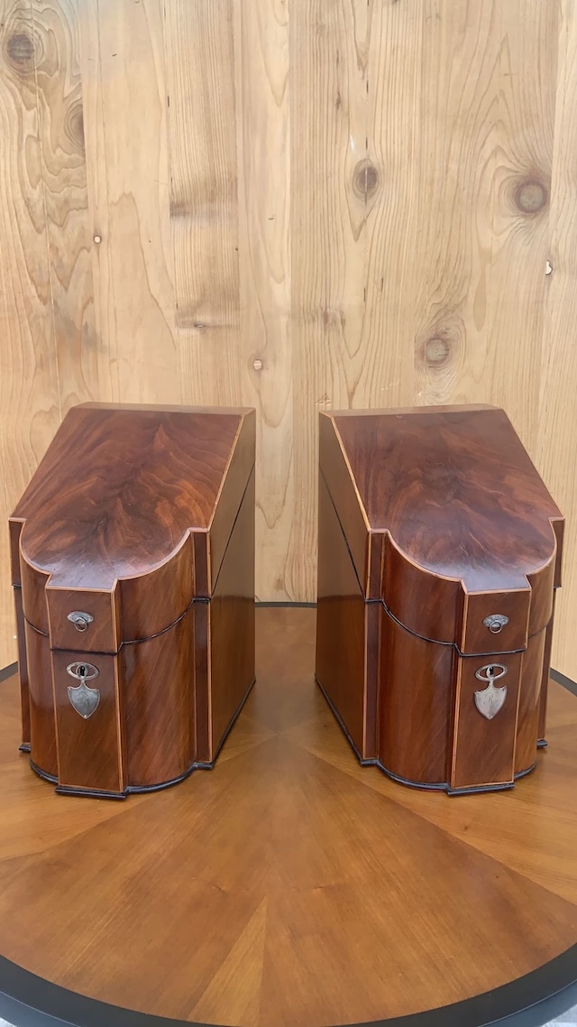 Polished Georgian knife boxes with a rich walnut exterior and symmetrical design