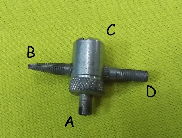 An image identifying the key parts of the tire valve tool for various functions