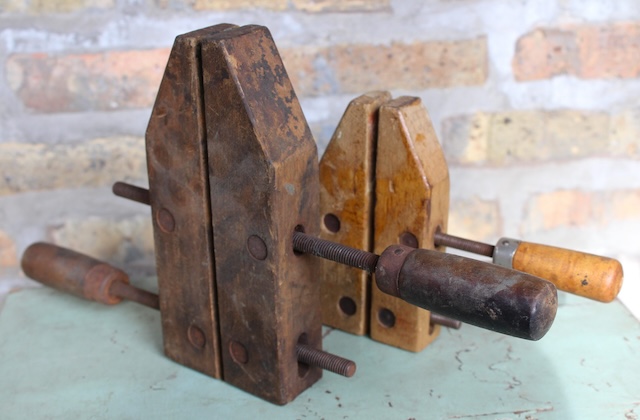 With rich patina and well-loved handles, this pair of vintage adjustable wood clamps stands as a tribute to traditional craftsmanship