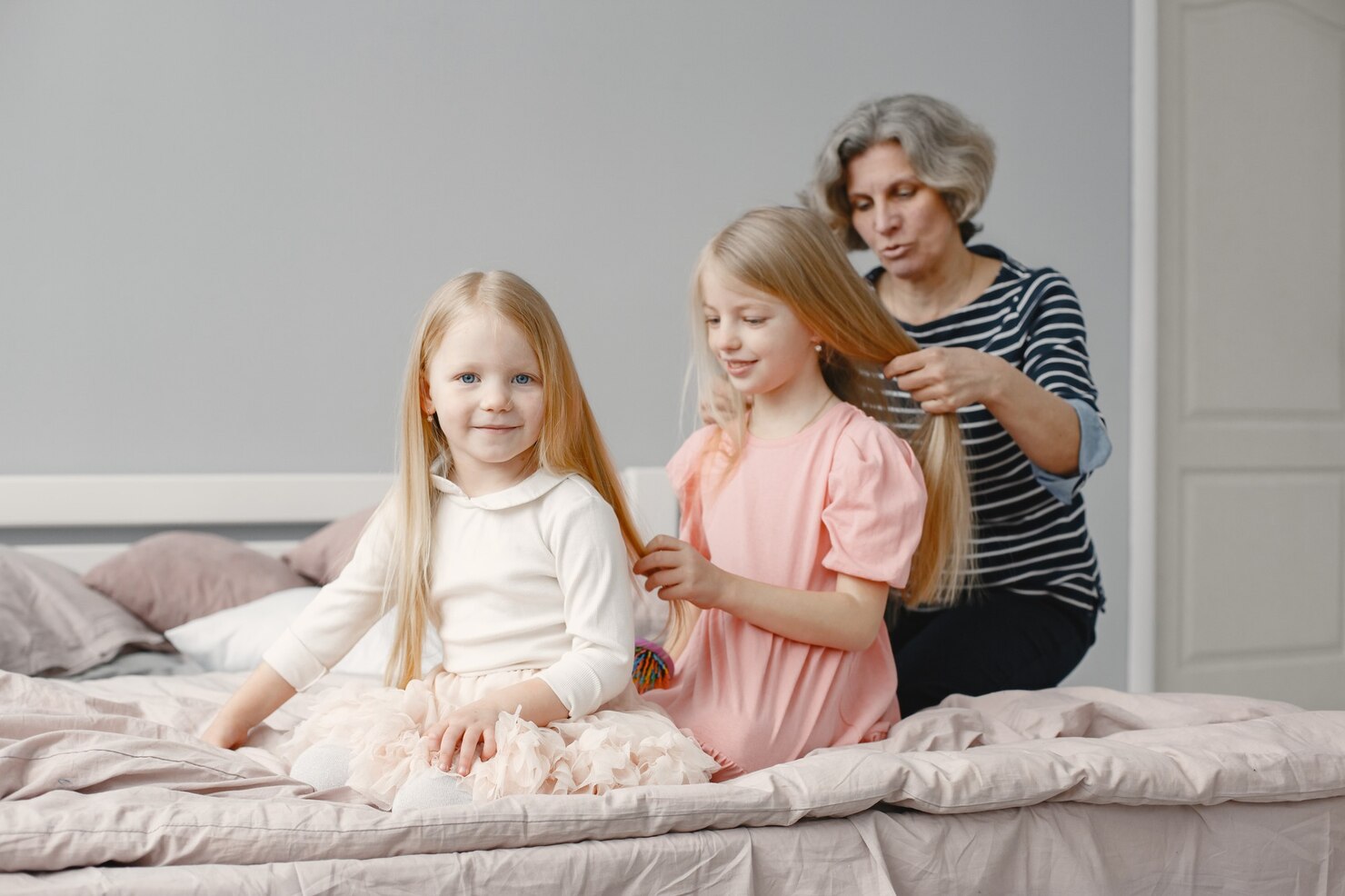 The gentle hands of grandma create the most beautiful memories. Braiding hair isn't just a daily routine; it's grandma's way of passing down her love